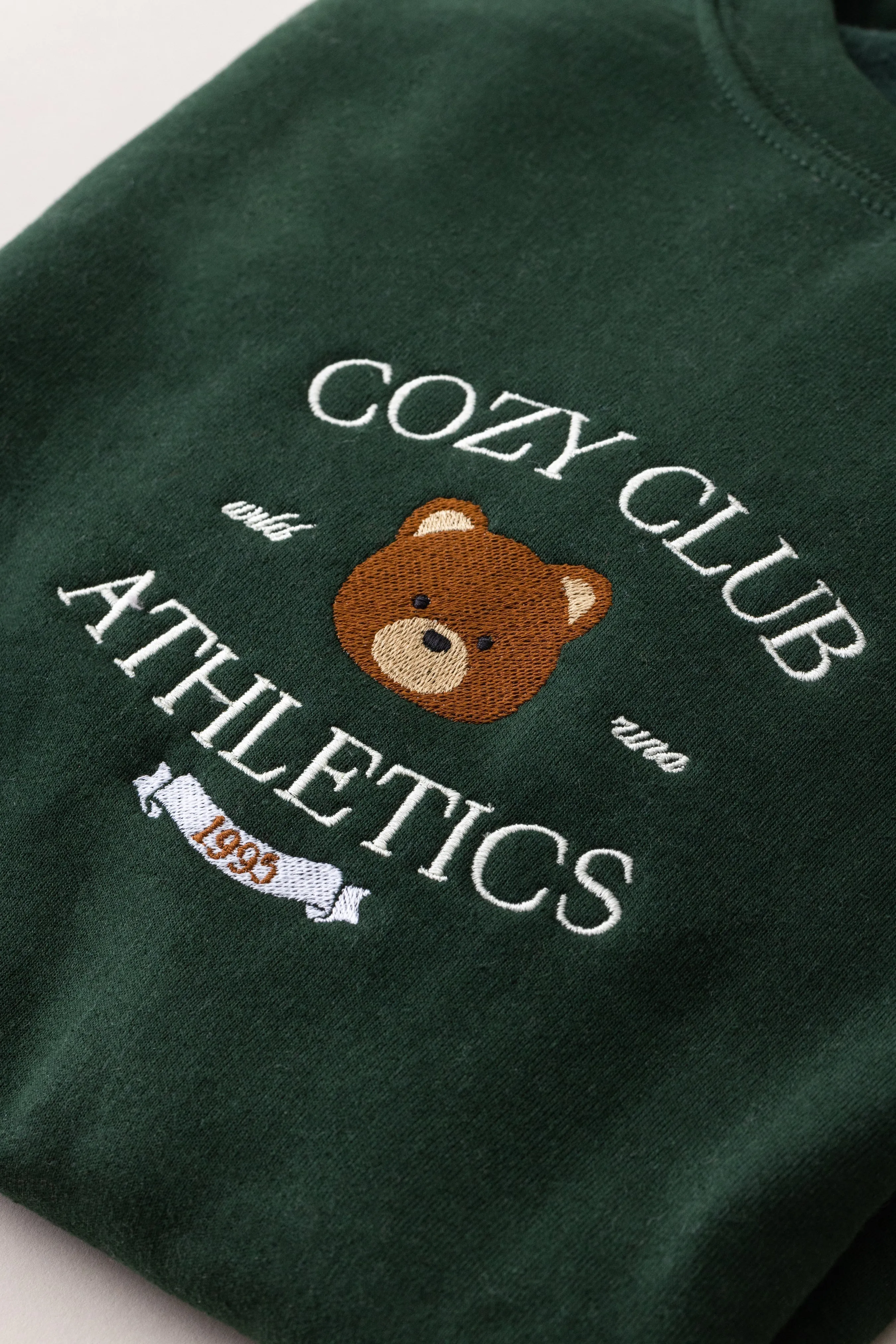 Cozy Club Athletic Crewneck Sweater